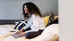 Female student studying on laptop