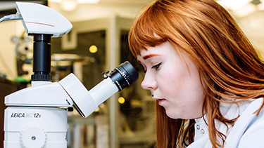 Female student doing experiment in the lab