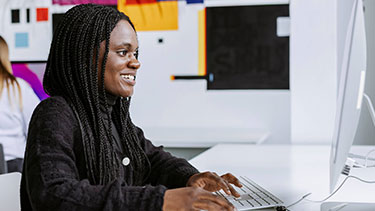 Female student using computer