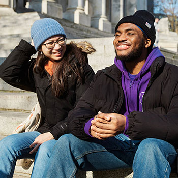 Male and female student socialising in Portsmouth city centre