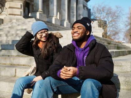 Students sitting in the sunshine