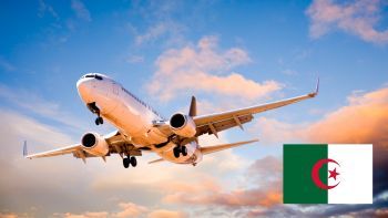 Airplane next to Algeria flag